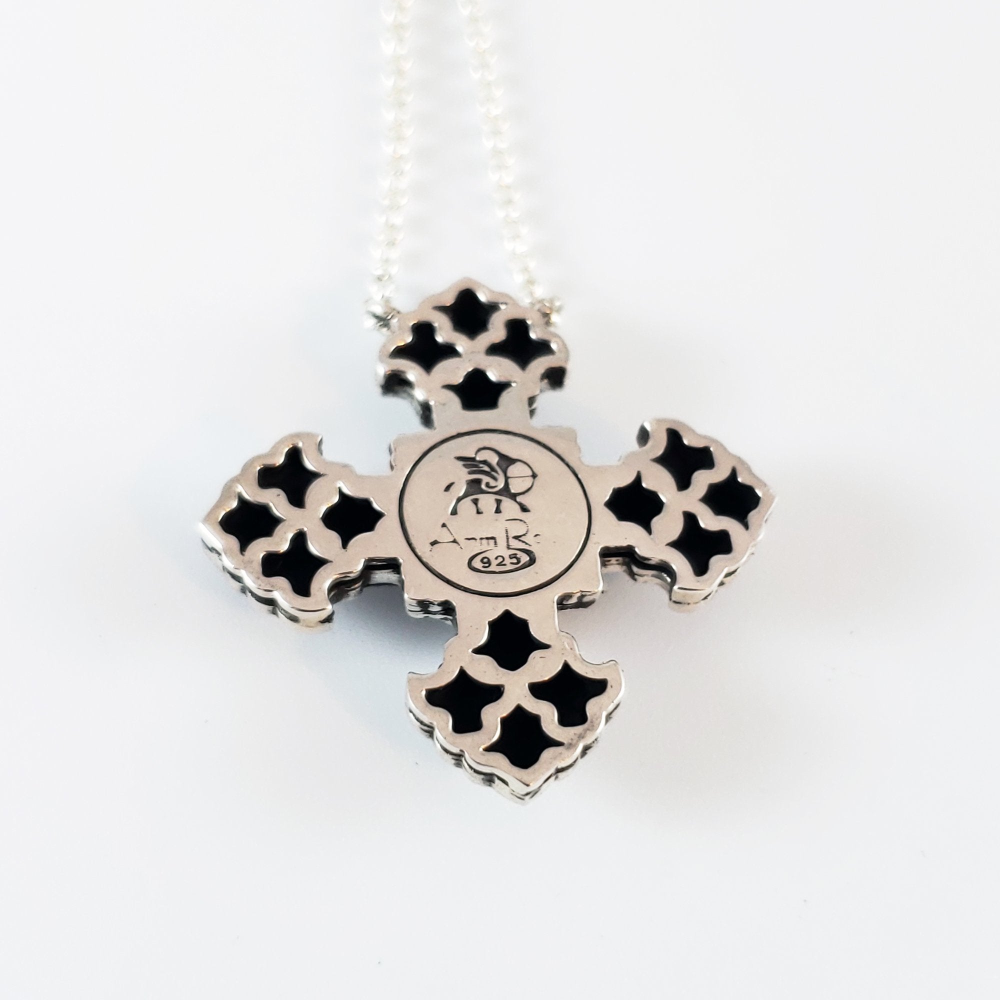 Arm Root Cross with Blue Corundum